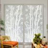Tall sliding glass doors decorated with Big Bamboo privacy window film.