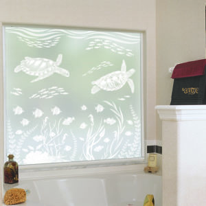 A tub window decorated with Sea Turtle Cove etched glass privacy window film.