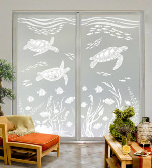 Sea Turtle Cove decorative window film on large sliding glass doors. Privacy etched glass scene features sea turtles, reef fish, sea horses and more.