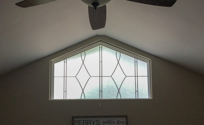Transom window decorated with Allure design.