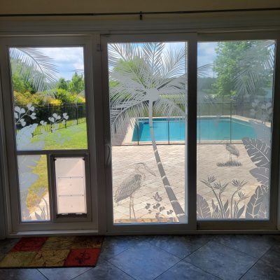 Decorate 3 doors with an etched glass heron hideaway scene.